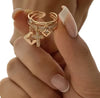 Cross charm ring